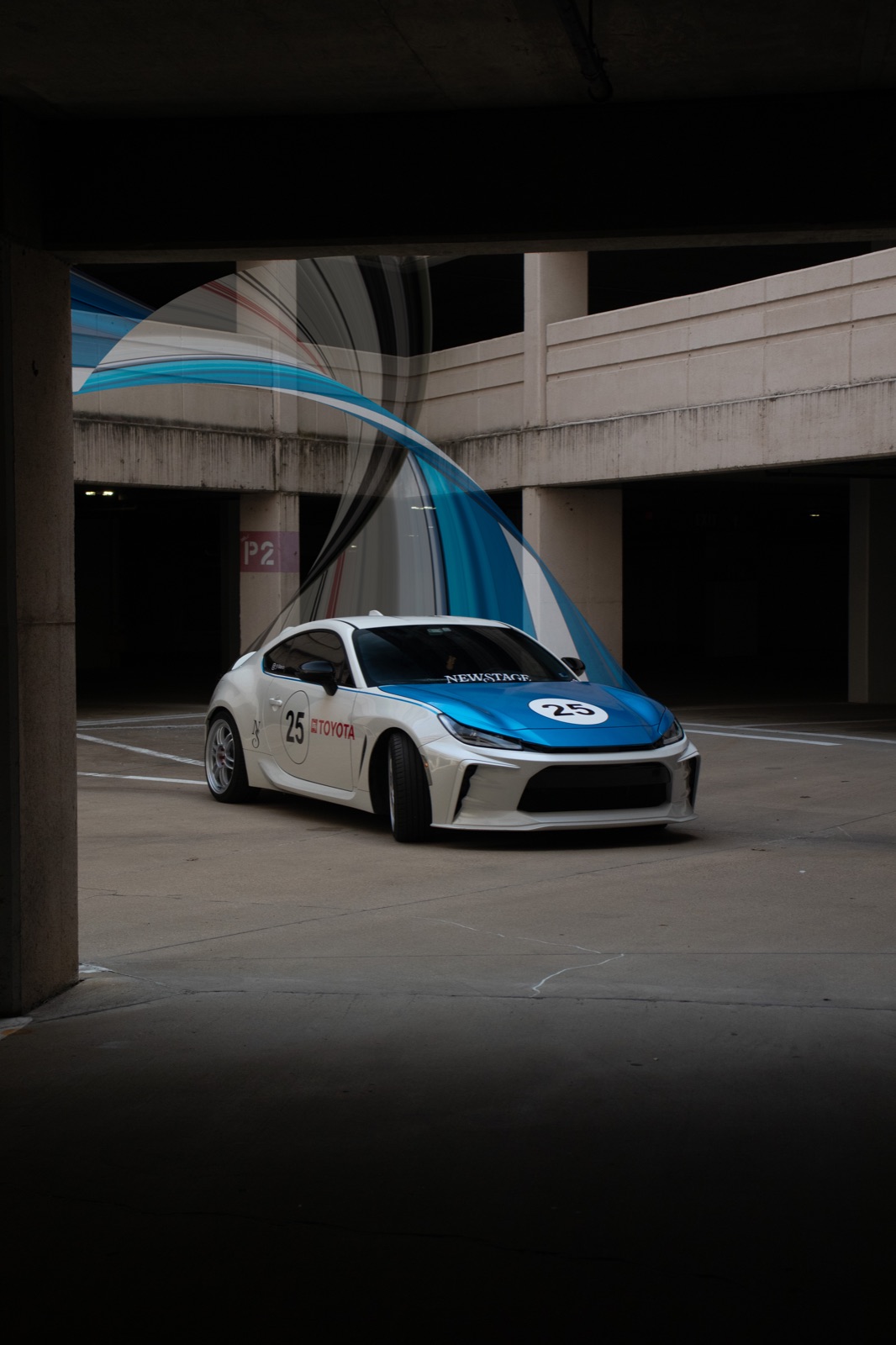 Liveried coupe with sweeping composite graphics