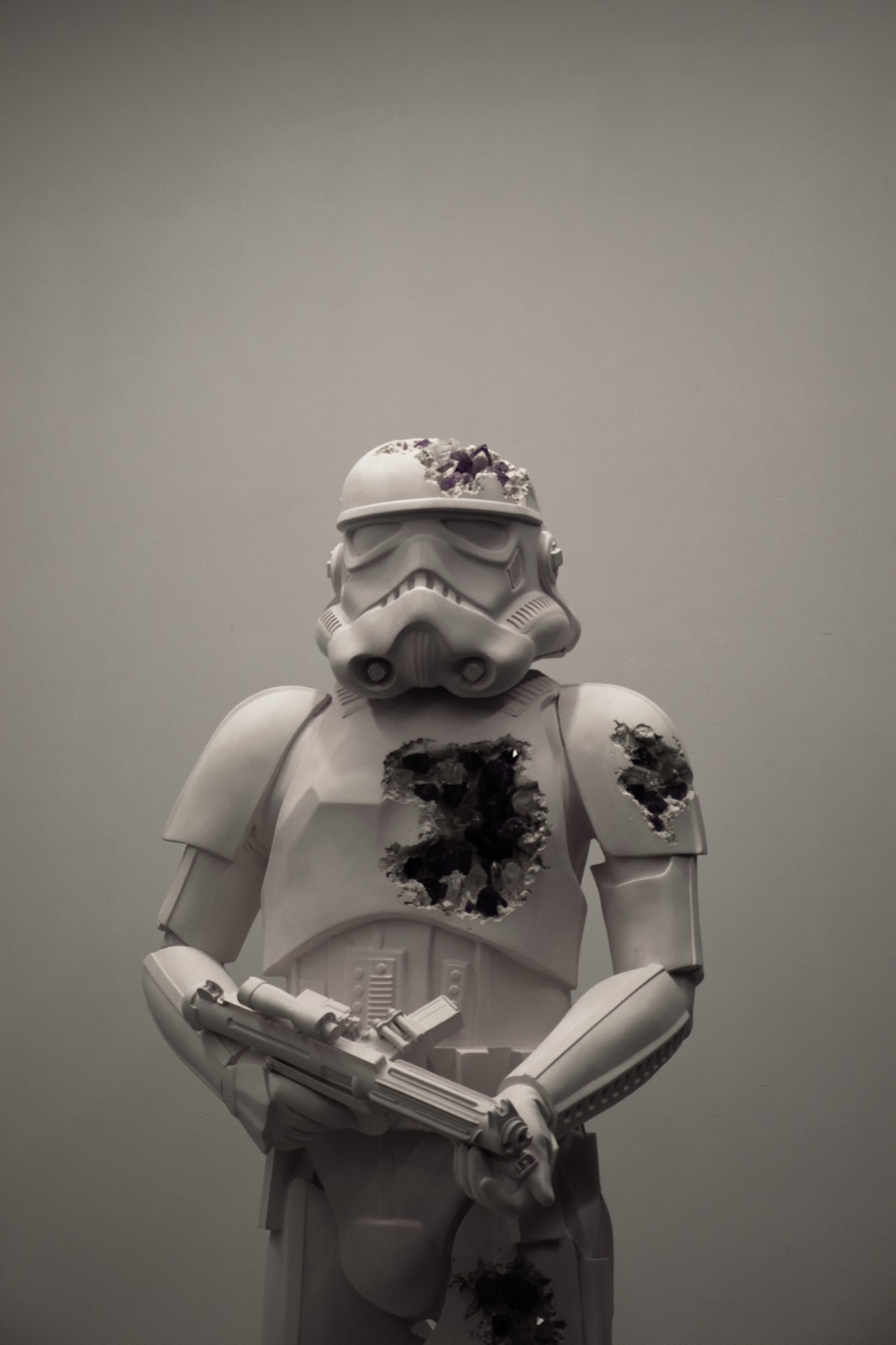 Crystal-filled stormtrooper figure against a grey wall