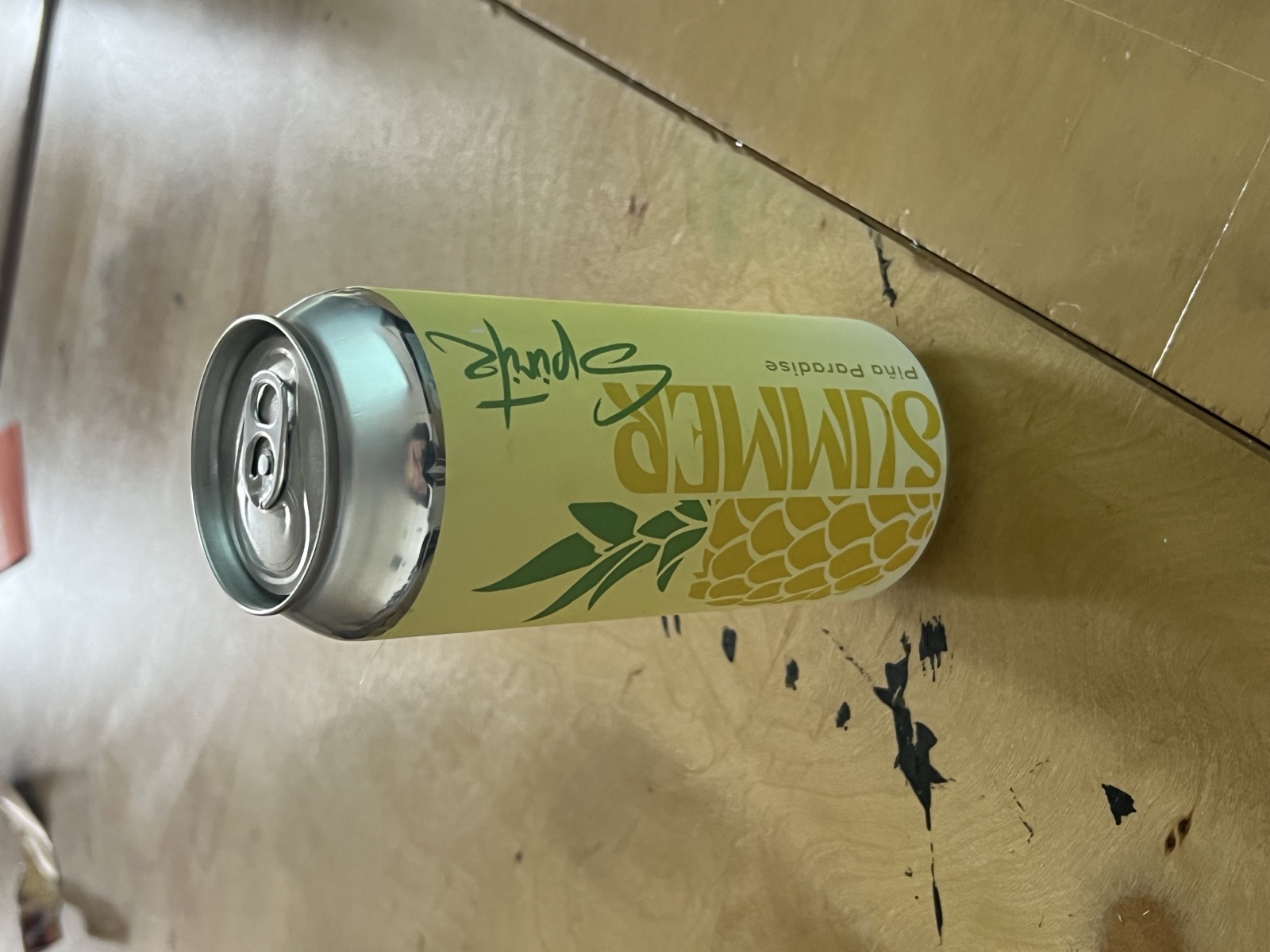 Printed can in hand